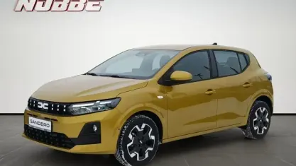 Neu Dacia Sandero Journey 101 PS (74 kW) 2026 Amber yellow Kleinwagen