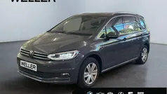 Grau Gebraucht 2022 VW Touran Highline Van / Kleinbus | 30.990 € (Fairer Preis)