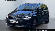 Grau Gebraucht 2021 VW Touran Highline Van / Kleinbus | 27.849 € (Fairer Preis)