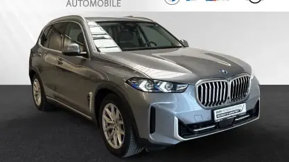 Gebraucht BMW X5 Sport Line 489 PS (359 kW) 2024 Skyscraper grau metallic SUV