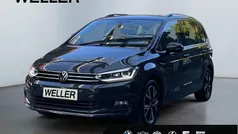 Grau Gebraucht 2021 VW Touran Highline Van / Kleinbus | 27.849 € (Fairer Preis)