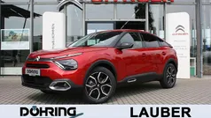 Elixirrot Gebraucht 2023 Citroën e-C4 Shine Limousine | 19.940 € (Guter Preis)
