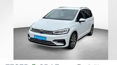 Pure white Gebraucht 2024 VW Touran R-line Van / Kleinbus | 36.440 € (Fairer Preis)