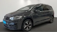 Grau Gebraucht 2022 VW Touran Highline Van / Kleinbus | 29.848 € (Fairer Preis)