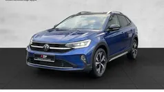 Reef blue metallic / schwarz Gebraucht 2024 VW Taigo Style SUV | 27.890 € (Fairer Preis)