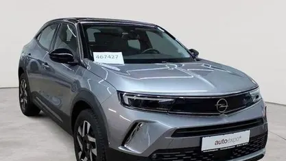 Gebraucht Opel Mokka-e Elegance 100 kW (136 PS) 2023 Quarz silber metallic SUV