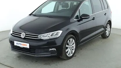 Second-hand VW Touran Highline 150 CP (110 kW) 2017 Negru Monovolum