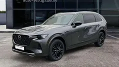 Machine grey metallic Gebraucht 2024 Mazda CX-80 Homura-Line SUV | 55.490 € (Guter Preis)