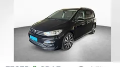 Pure white Gebraucht 2024 VW Touran R-line Van / Kleinbus | 36.950 € (Fairer Preis)