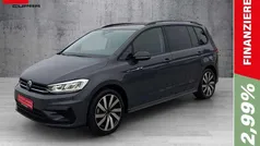 Grau Gebraucht 2024 VW Touran Pro Van / Kleinbus | 36.950 € (Fairer Preis)