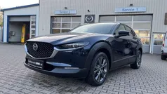 Deep crystal blue Gebraucht 2024 Mazda CX-30 Exclusive SUV | 26.590 € (Fairer Preis)