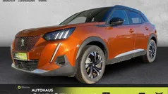 Orange Gebraucht 2023 Peugeot e-2008 GT SUV | 22.990 € (Fairer Preis)