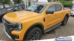 Cyber orange 3c Gebraucht 2024 Ford Ranger Wildtrack Abholung | 45.890 € (Fairer Preis)
