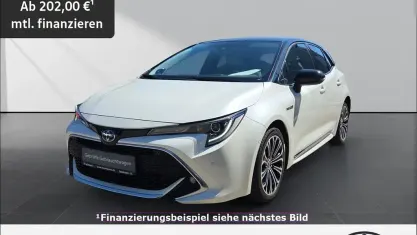 Gebraucht Toyota Corolla Hybrid Lounge 184 PS (135 kW) 2019 Weiß Limousine
