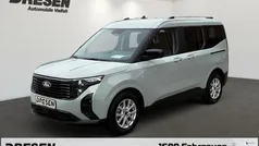 Grau Gebraucht 2024 Ford Tourneo Courier Titanium Van / Kleinbus | 25.990 € (Fairer Preis)