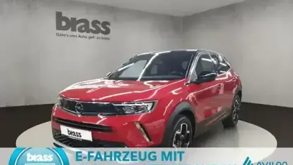 Gebraucht Opel Mokka-e Ultimate 100 kW (136 PS) 2022 Power rot / kosmos rot SUV