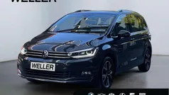 Grau Gebraucht 2021 VW Touran Highline Van / Kleinbus | 27.849 € (Fairer Preis)