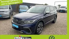 Atlantic blue metallic Gebraucht 2024 VW Tiguan Allspace R-line SUV | 46.600 € (Fairer Preis)