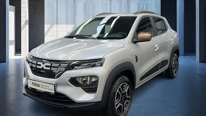 Gebraucht Dacia Spring Extreme 47 kW (65 PS) 2024 Diamantsilbergrau Kleinwagen