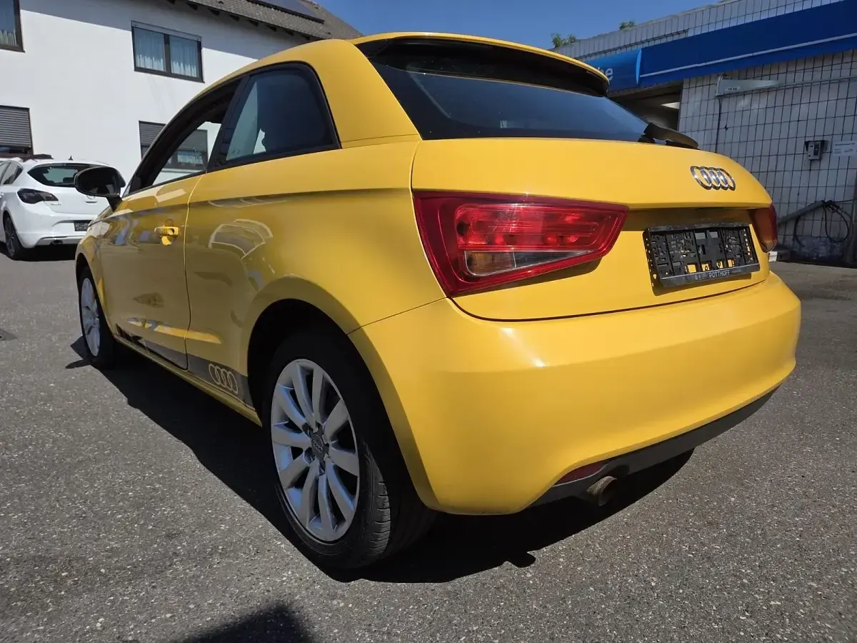 Gebraucht Audi A1 Attraction 86 PS (63 kW) 2013 Gelb Kleinwagen