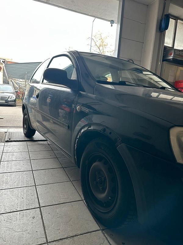 Second-hand Opel Corsa 60 CP (44 kW) 2004 Negru Hatchback