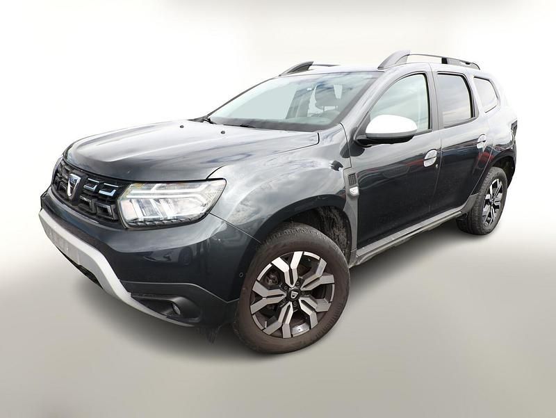 Kometen grau metallic Gebraucht 2022 Dacia Duster Prestige SUV | 17.449 € (Fairer Preis) - Bild 1/4