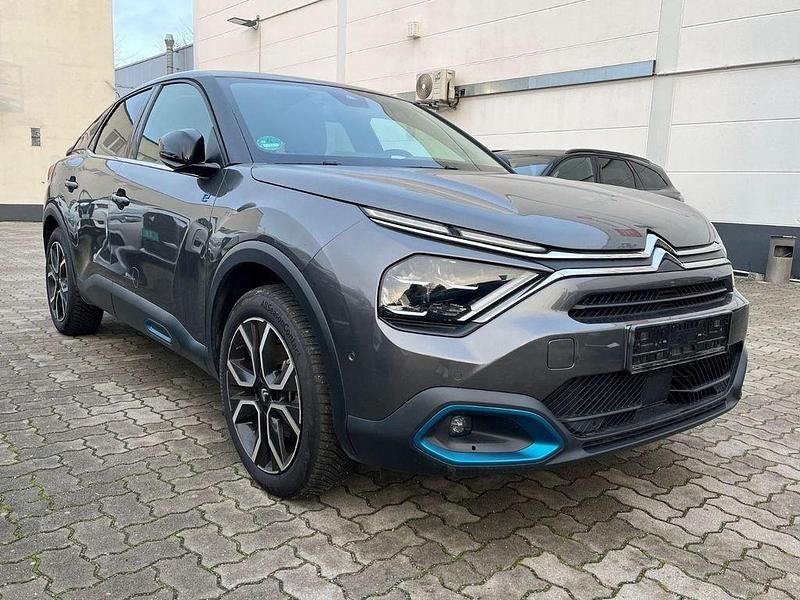 Grau Gebraucht 2023 Citroën e-C4 Shine Limousine | 16.500 € (Superpreis) - Bild 1/4