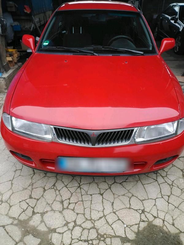 Gebraucht Mitsubishi Carisma 125 PS (91 kW) 1999 Rot Kombi