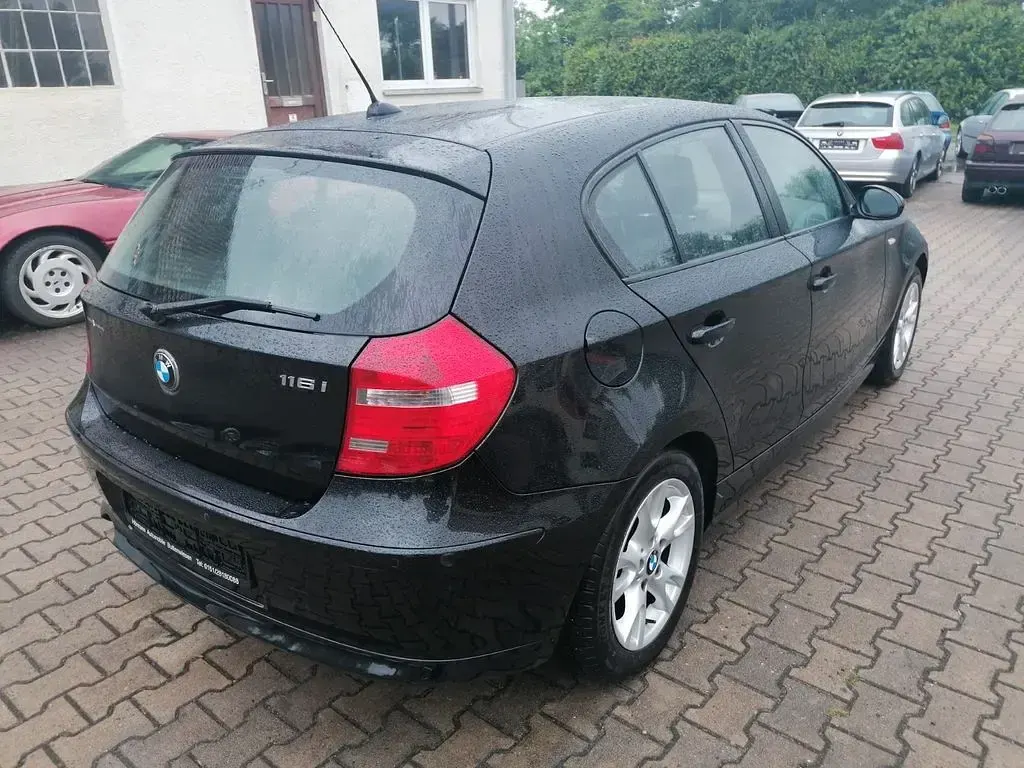Gebraucht BMW 116 122 PS (89 kW) 2009 Schwarz Kleinwagen