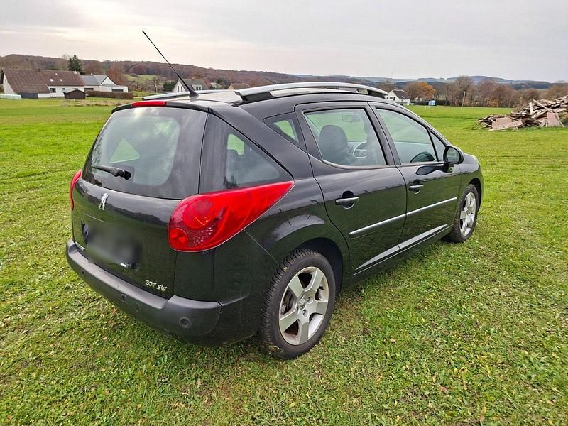 Gebraucht Peugeot 207 112 PS (82 kW) 2012 Grau Kombi