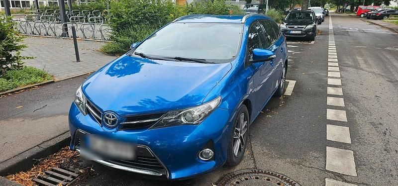 Blau Gebraucht 2014 Toyota Auris Hybrid Kombi | 11.875 € (Fairer Preis) - Bild 1/4