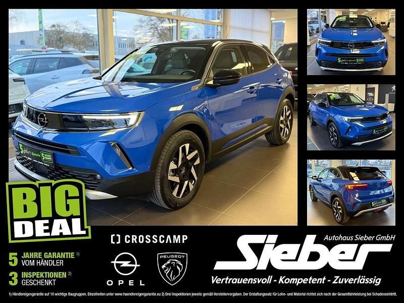 Lackierung voltaic blue met/ty Gebraucht 2023 Opel Mokka-e Elegance SUV | 20.100 € (Fairer Preis) - Bild 1/4