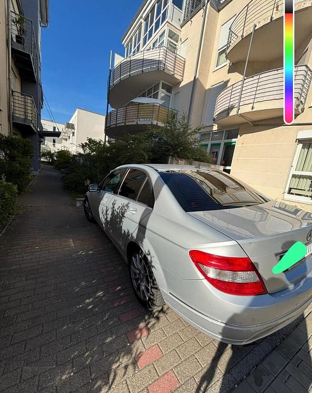 Silber Gebraucht 2009 Mercedes C180 Limousine | 8.999 € - Bild 1/4