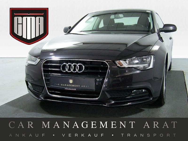Lavagrau perleffekt (metallic) Gebraucht 2014 Audi A5 Premium Coupé | 13.451 € (Fairer Preis) - Bild 1/4