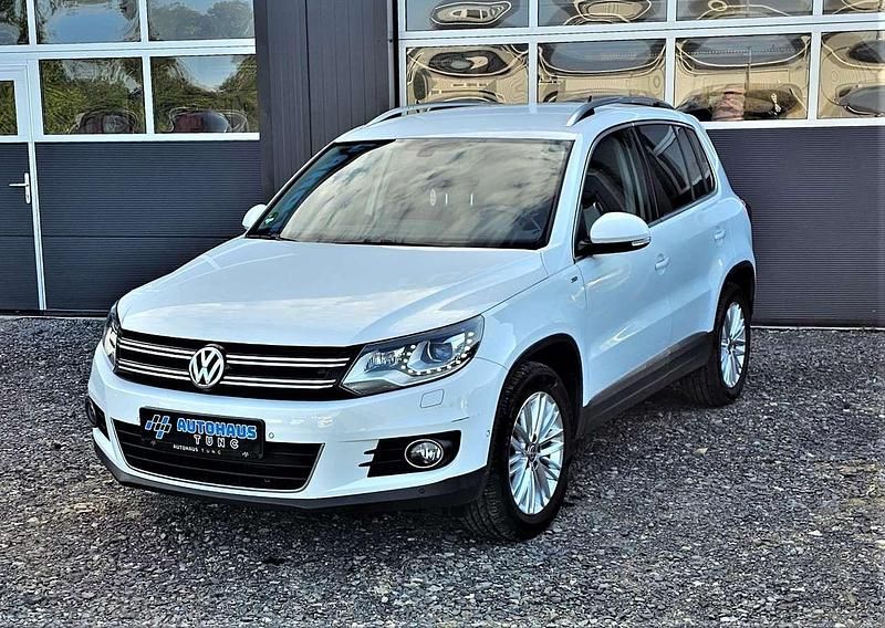Pure white (metallic) Gebraucht 2014 VW Tiguan Cup SUV | 11.800 € (Fairer Preis) - Bild 1/3