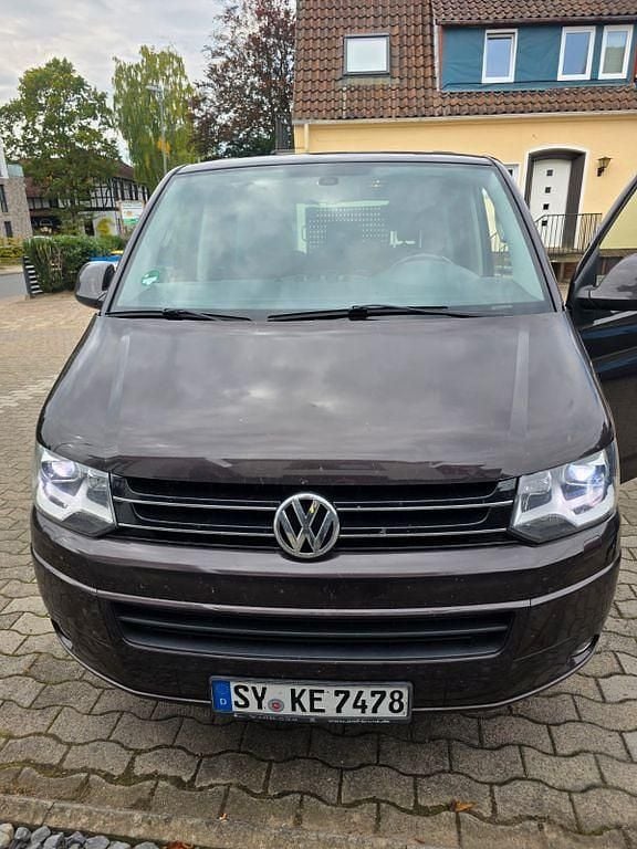 Violet Gebraucht 2012 VW Caravelle Van / Kleinbus | 14.990 € (Fairer Preis) - Bild 1/4