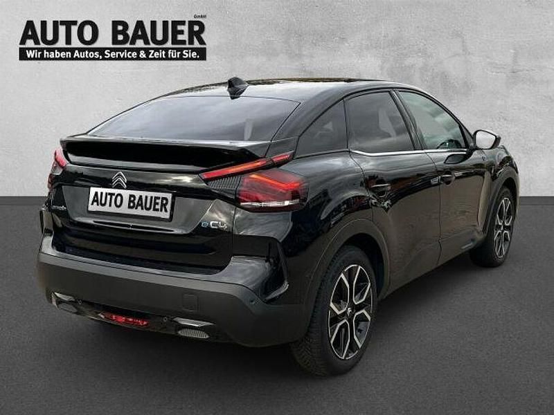 Gebraucht Citroën e-C4 Shine 100 kW (136 PS) 2023 Schwarz Limousine