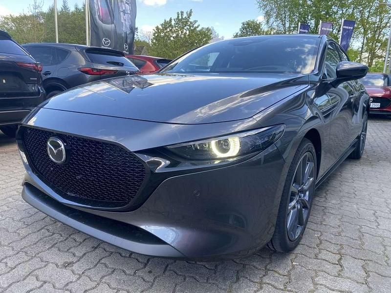 Machine grey Neu 2025 Mazda 3 Takumi-Line Limousine | 34.980 € - Bild 1/4