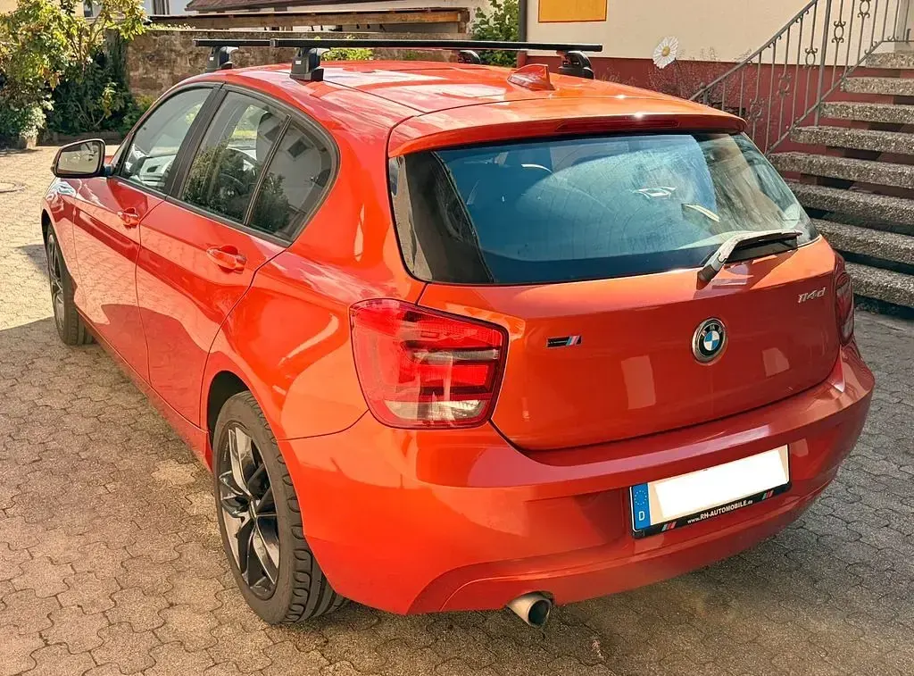Gebraucht BMW 114 95 PS (69 kW) 2013 Orange Kleinwagen