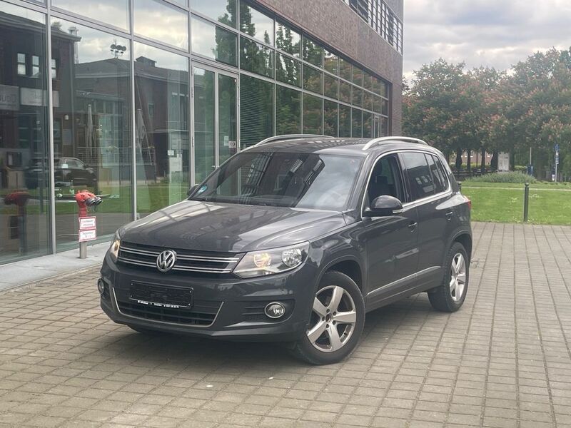 Grau Gebraucht 2016 VW Tiguan LOUNGE SUV | 12.790 € (Guter Preis) - Bild 1/4