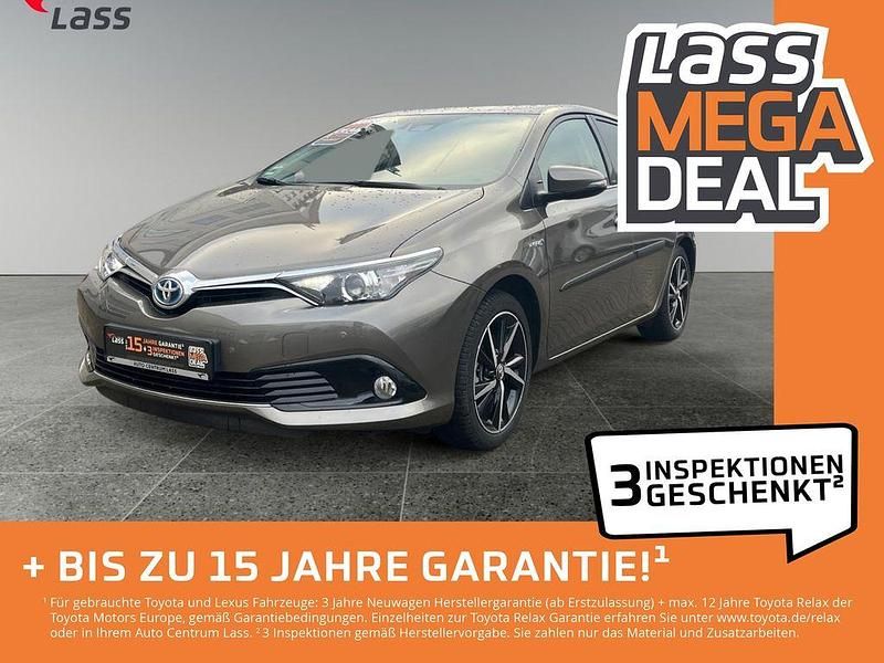 Platinum bronze metallic Gebraucht 2017 Toyota Auris Hybrid Basis Limousine | 15.980 € (Fairer Preis) - Bild 1/4