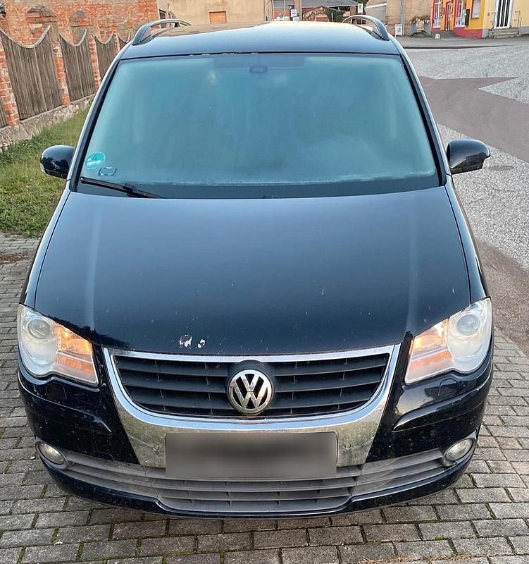 Gebraucht VW Touran 105 PS (77 kW) 2008 Schwarz Van / Kleinbus