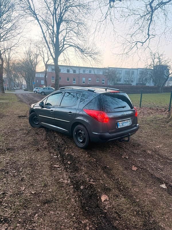 Gebraucht Peugeot 207 70 PS (51 kW) 2012 Schwarz Kombi