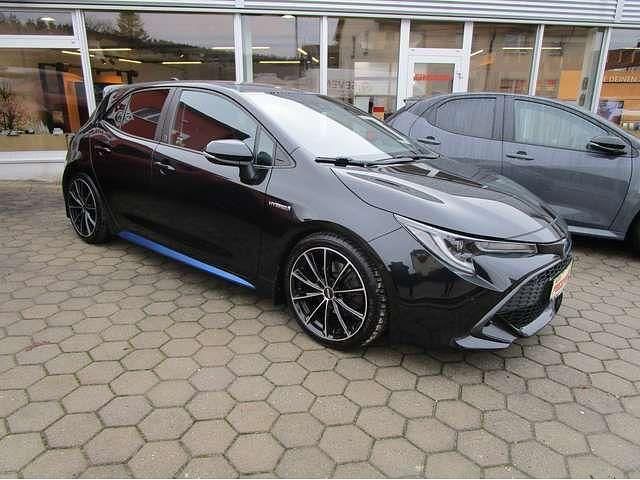 Schwarz Gebraucht 2021 Toyota Corolla Hybrid Team Limousine | 21.490 € (Fairer Preis) - Bild 1/4