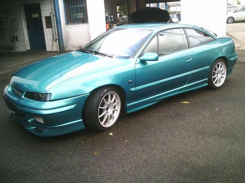 Caribik blau met Gebraucht 1992 Opel Calibra Coupé | 11.500 € - Bild 1/4