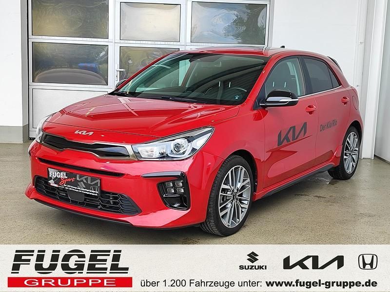Signalrot met. Gebraucht 2023 Kia Rio GT-Line Limousine | 20.699 € (Fairer Preis) - Bild 1/4
