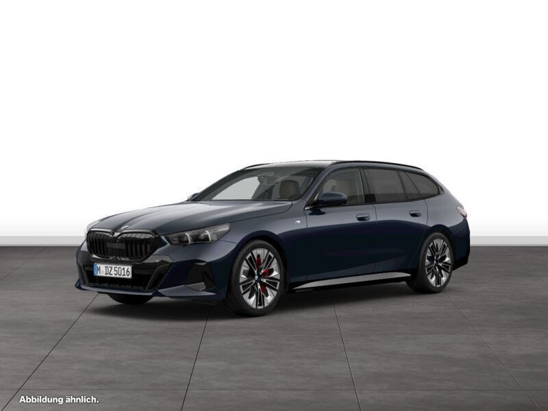 Carbonschwarz metallic Gebraucht 2024 BMW 540 Comfort Edition Kombi | 74.364 € - Bild 1/4