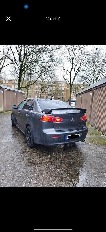 Second-hand Mitsubishi Lancer 140 CP (102 kW) 2009 Negru Berlinǎ