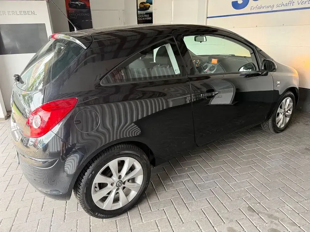 Gebraucht Opel Corsa Active 87 PS (63 kW) 2013 Schwarz Kleinwagen