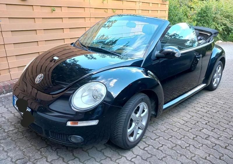 Gebraucht VW New Beetle 102 PS (75 kW) 2010 Schwarz Kleinwagen